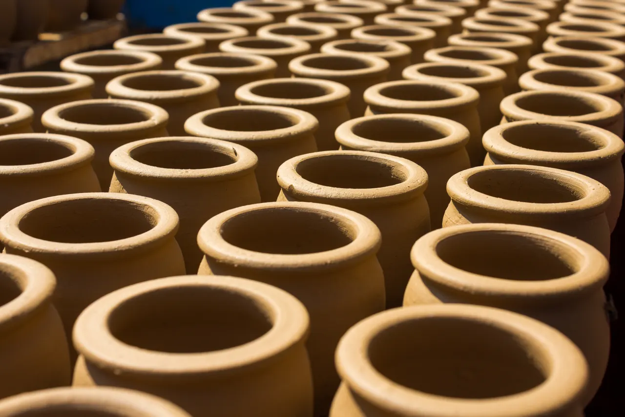 Earthen pots drying in the sun.
